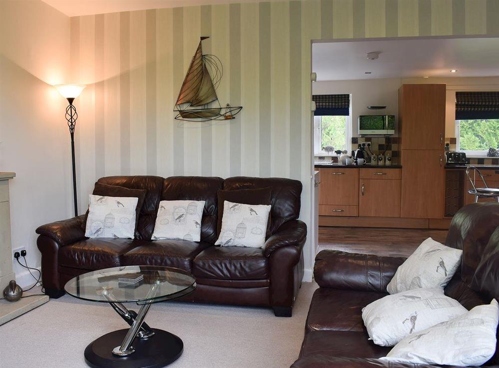 Living room and kitchen at Treetops** in , Bowness