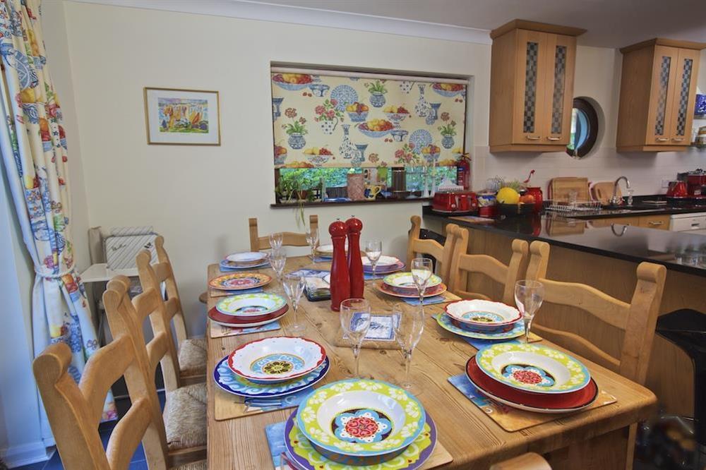 Dining area off the kitchen, leading to an enclosed terrace at Treetops in Moult Hill, Salcombe
