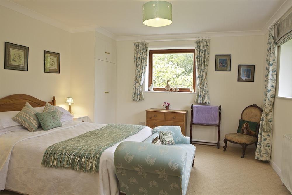 Master bedroom with en suite bathroom at Treetops in Moult Hill, Salcombe
