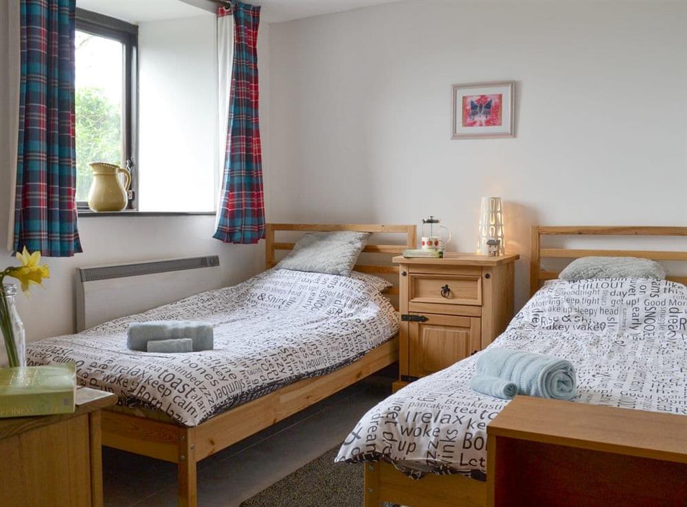 Comfortable twin bedroom at Treetops in Whitstone, near Bude, Cornwall
