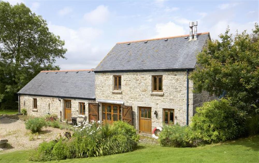 The Barn lies a quarter of a mile down its own lane with stunning views across rolling farmland adjacent to Cornwall’s Trevarno Estate and Gardens