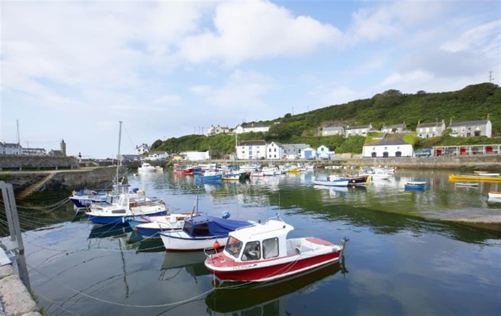 Nearby is the pretty harbour of Porthleven at Tregadjack Farmhouse, Tregathenan