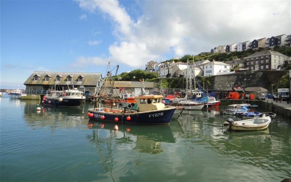 Boats in Mevagissey harbour at Tregarth in Gorran Haven