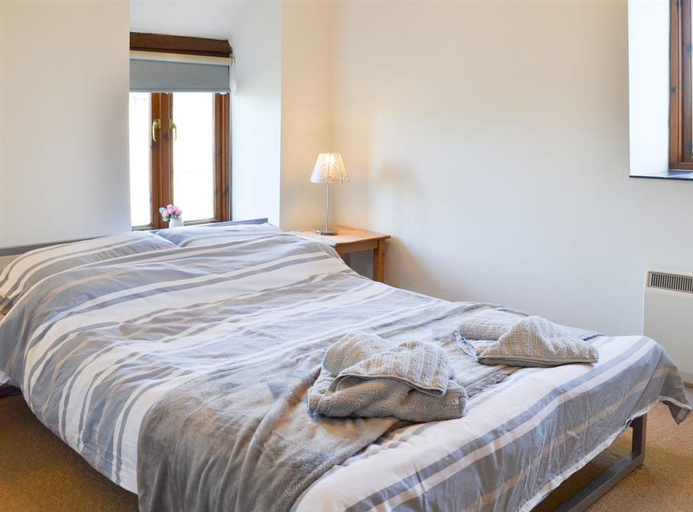 Beamed double bedroom at Tregella Farm Cottage in Near Padstow, Cornwall