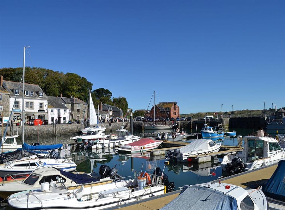 The nearby bustling fishing harbour town of Padstow at Tregella Farm Cottage in Near Padstow, Cornwall