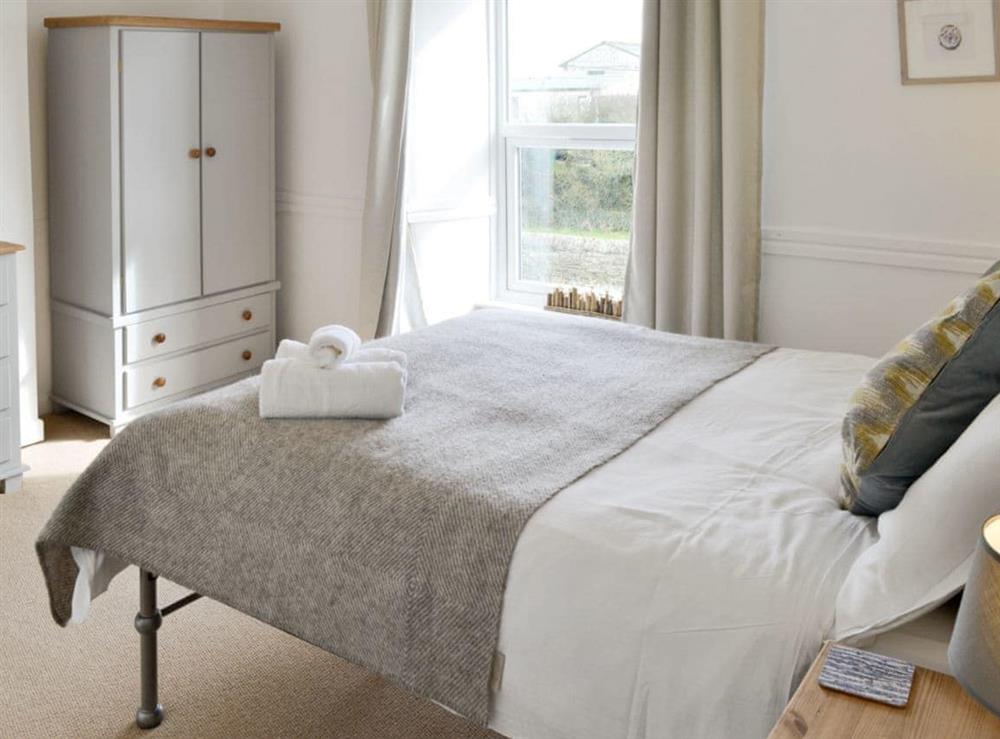 Airy double bedroom with en-suite at Treginegar Farmhouse in St Merryn, near Padstow, Cornwall
