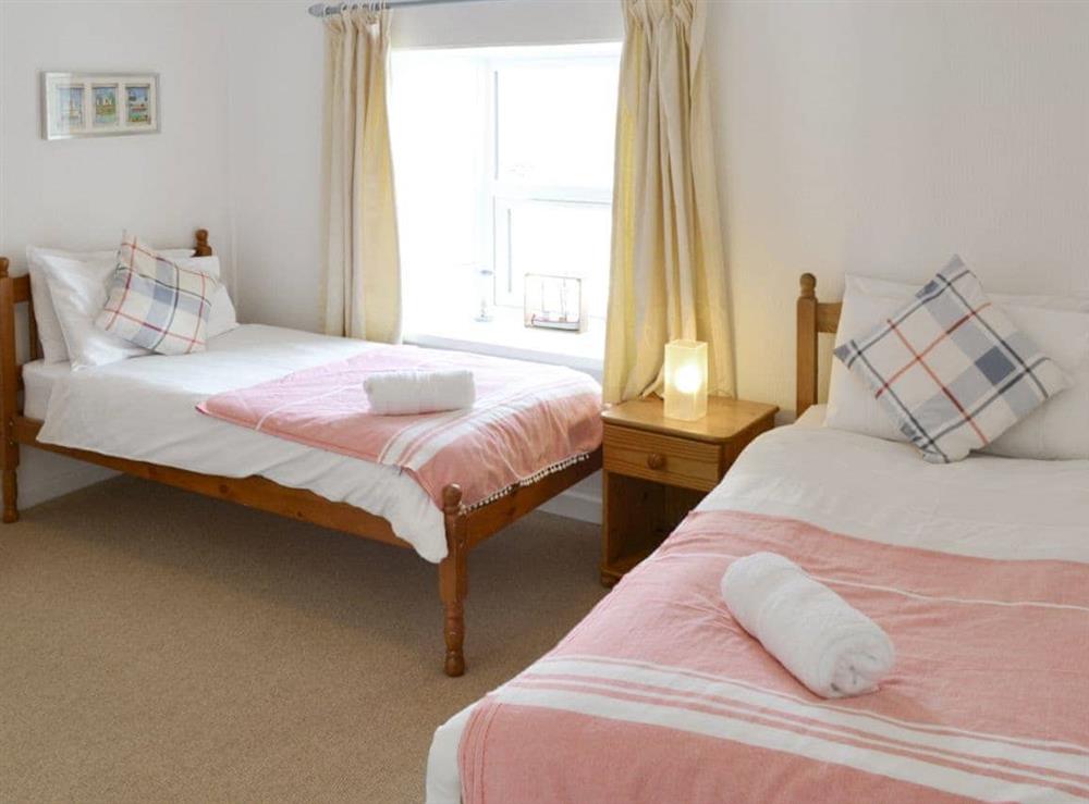 Good sized twin bedroom at Treginegar Farmhouse in St Merryn, near Padstow, Cornwall