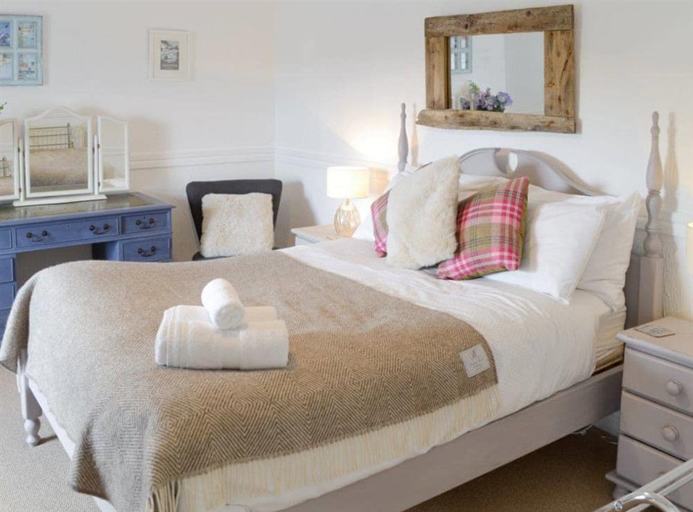 Peaceful double bedroom with en-suite at Treginegar Farmhouse in St Merryn, near Padstow, Cornwall