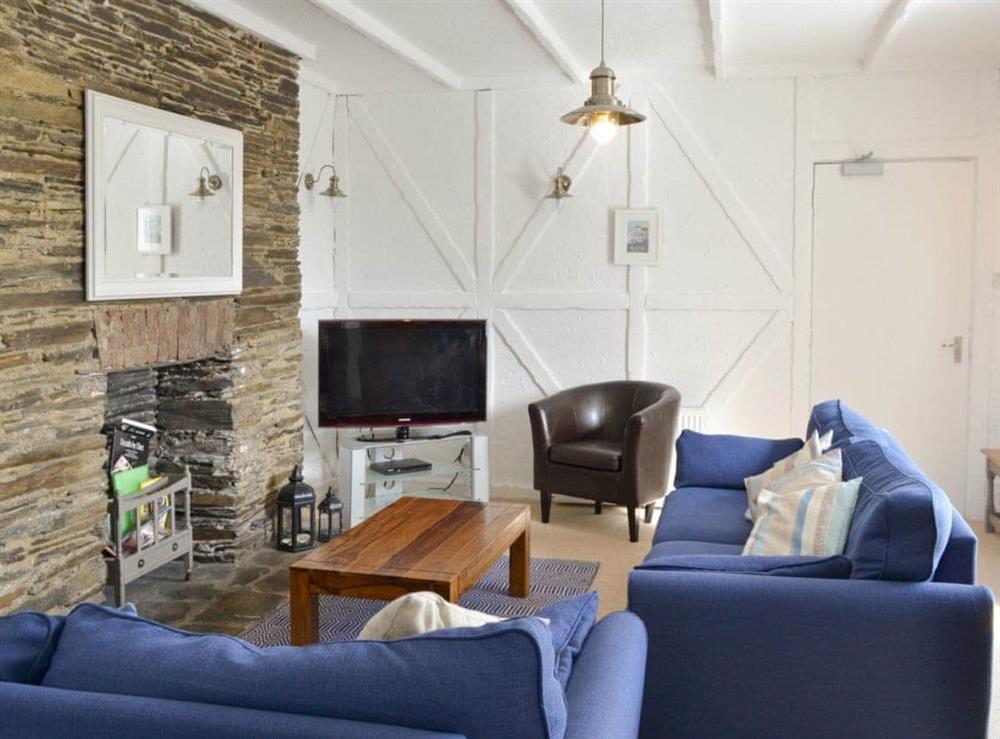 Welcoming living area at Treginegar Farmhouse in St Merryn, near Padstow, Cornwall