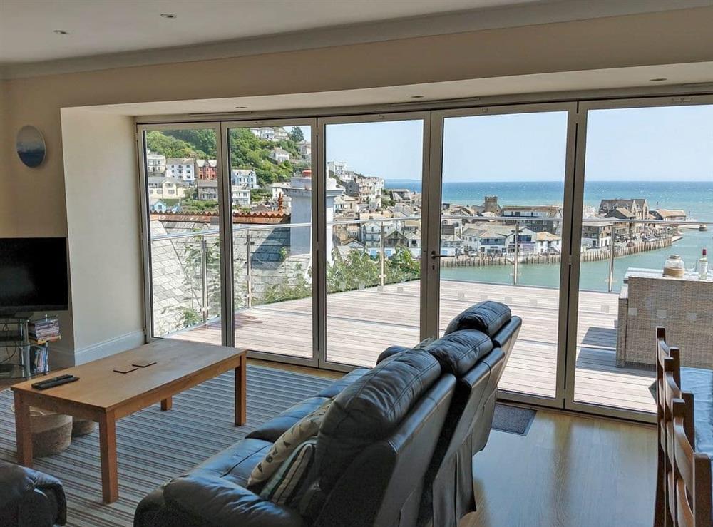 Light and airy living/dining room with amazing views at Tregolva in Looe, Cornwall