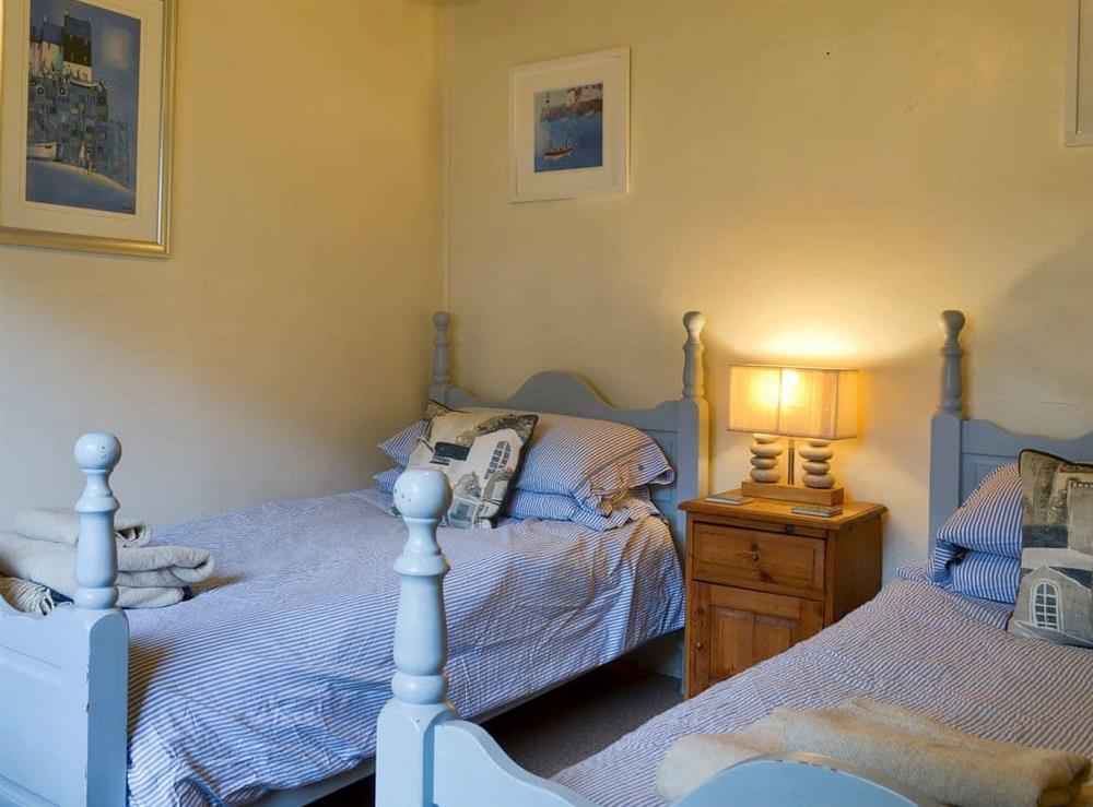 Twin bedroom at Tregullan Cottage in Boscastle, Cornwall