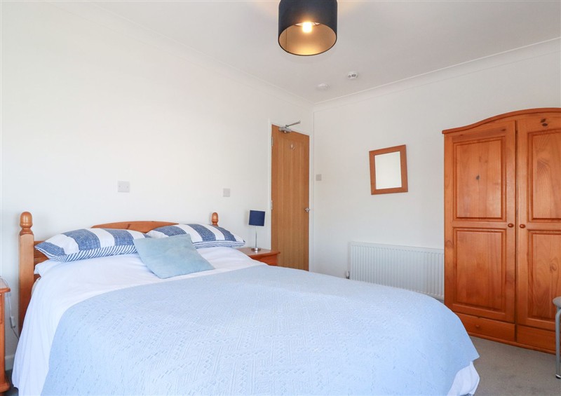 One of the bedrooms at Tregundy Farmhouse, Perranporth
