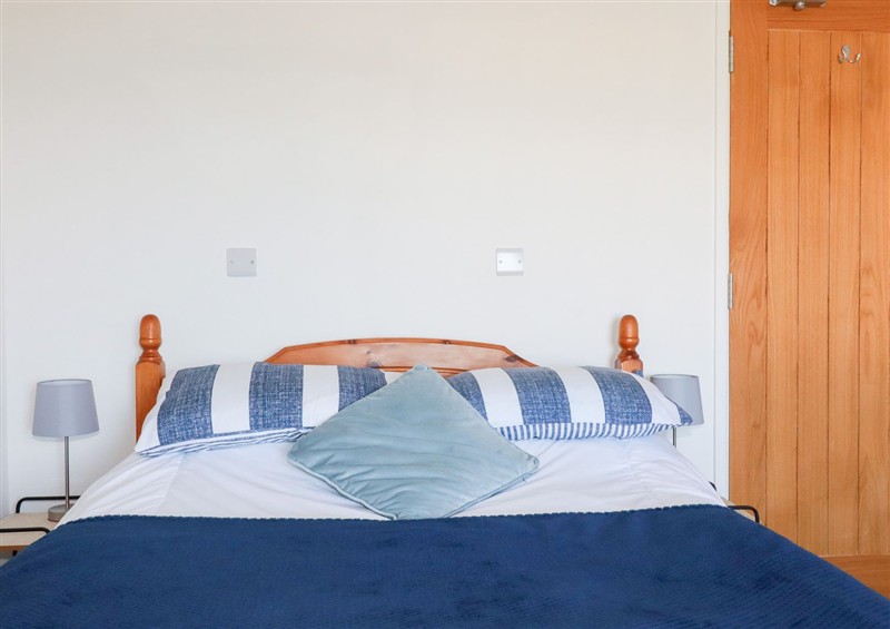 This is a bedroom (photo 3) at Tregundy Farmhouse, Perranporth