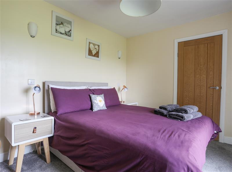 A bedroom in Tregynrig Bach at Tregynrig Bach, Cemaes Bay