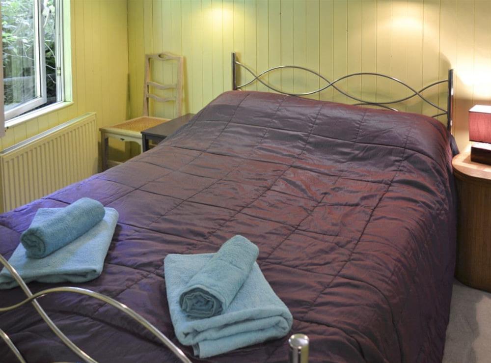 Delightful bedroom with double bed at Beach Retreat, 