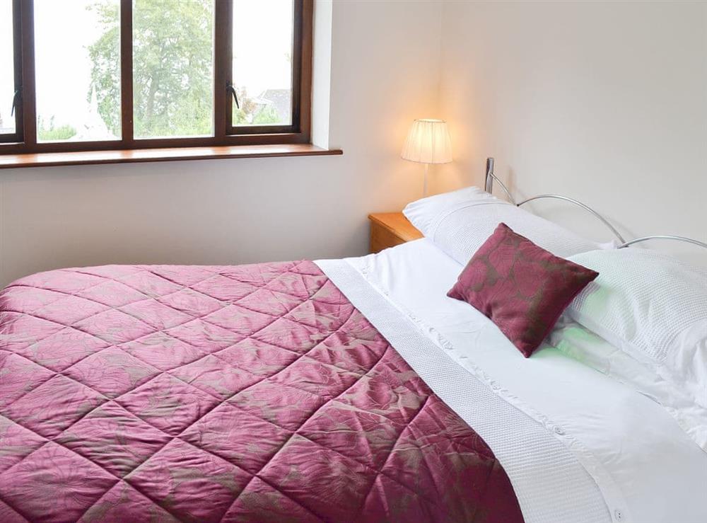 Inviting bedroom with double bed at Rivendell, 