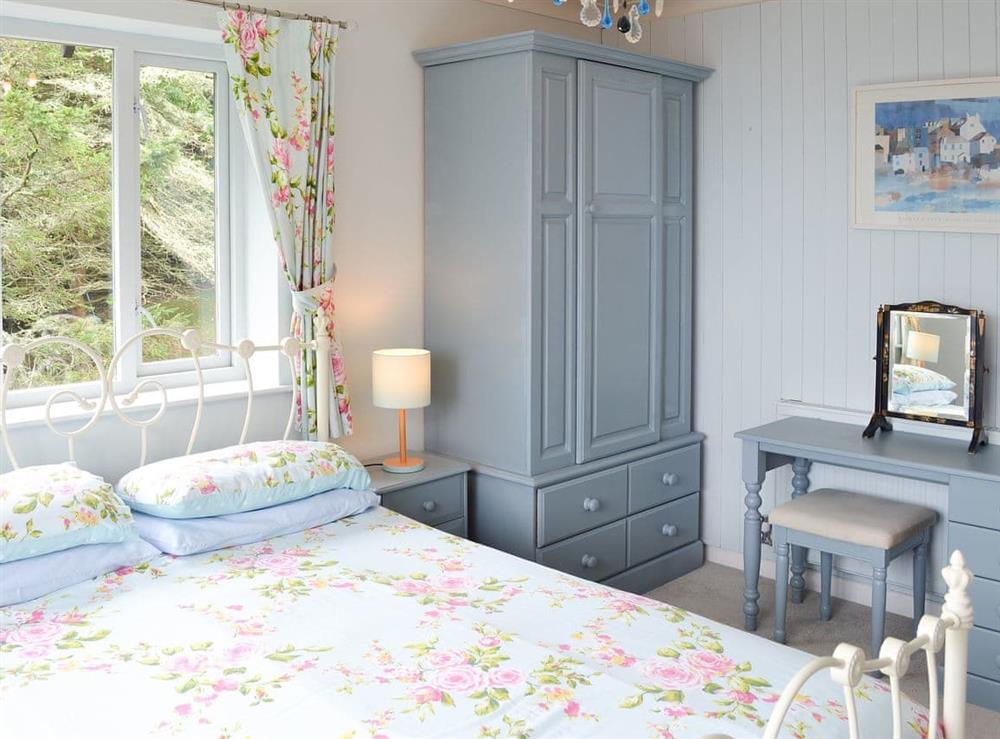 Tastefully furnished bedroom at Rivendell, 
