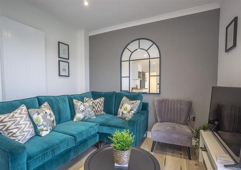 Relax in the living area at Trem Y Borth Apartment, Abersoch
