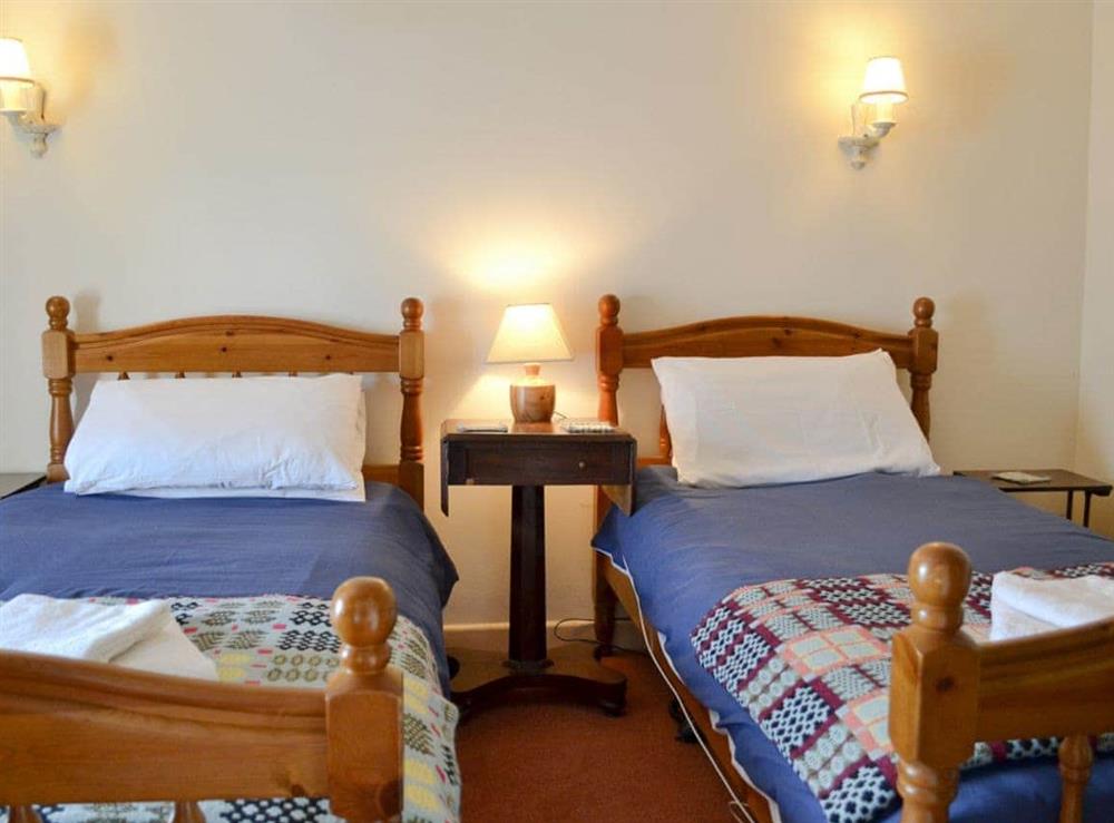 Twin bedroom at Trem-Y-Don Cottage in Trefin, near St. David’s, Dyfed