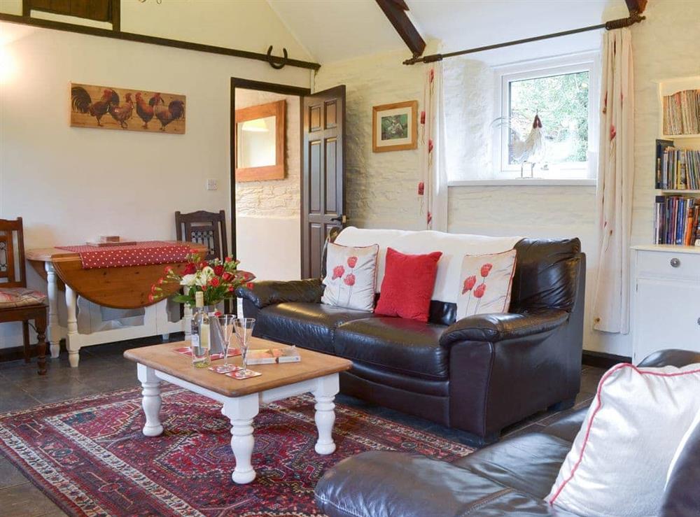 Comfortable living/dining room at Trenay Barn Cottage in St Neot, near Liskeard, Cornwall