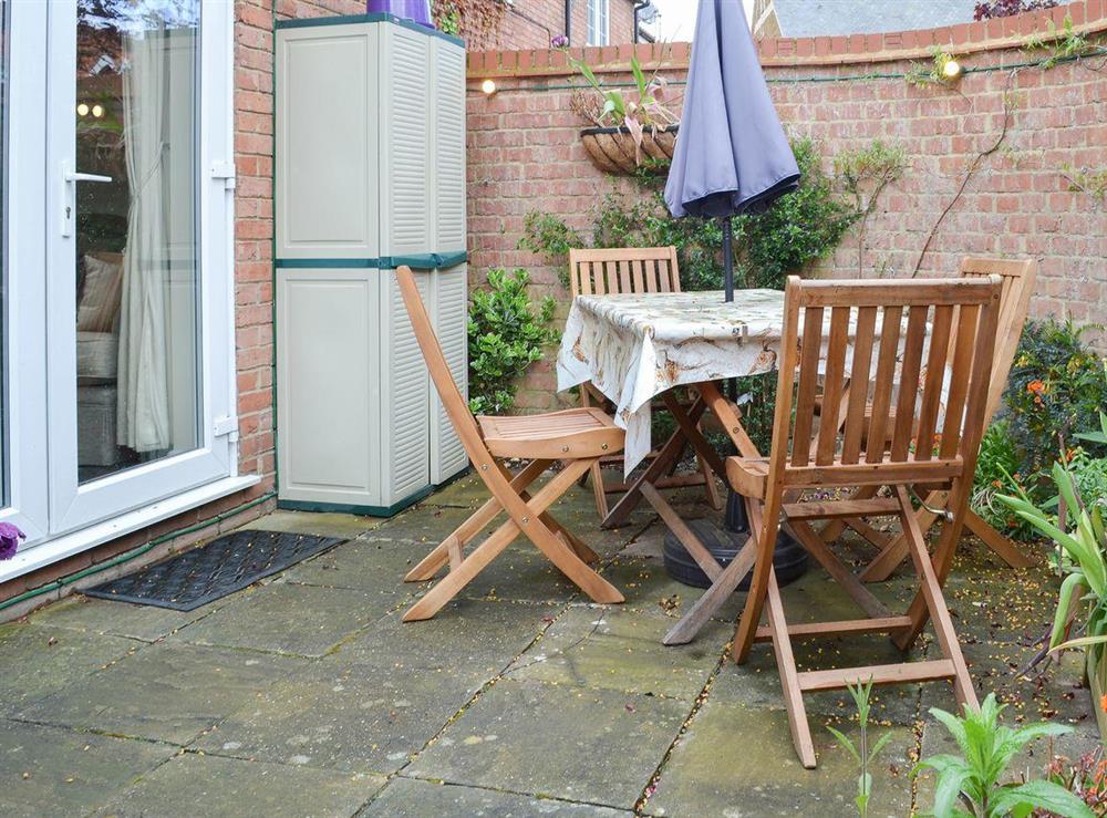 Shady and discrete patio at Trentham Cottage in Snettisham, near Hunstanton, Norfolk