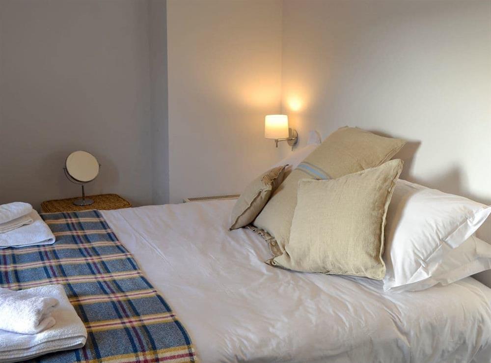 Relaxing bedroom with kingsize bed at Treplevna in Pendeen, Cornwall