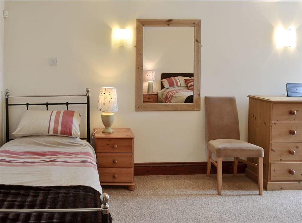 Bedroom with double bed and an additional single bed (photo 2) at Trescowthick Barn in St Newlyn, Cornwall