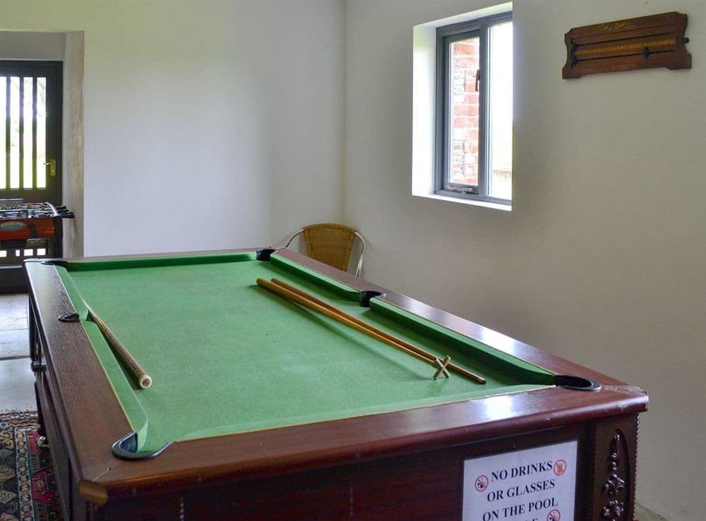 Garage with pool table and table football at Trescowthick Barn in St Newlyn, Cornwall