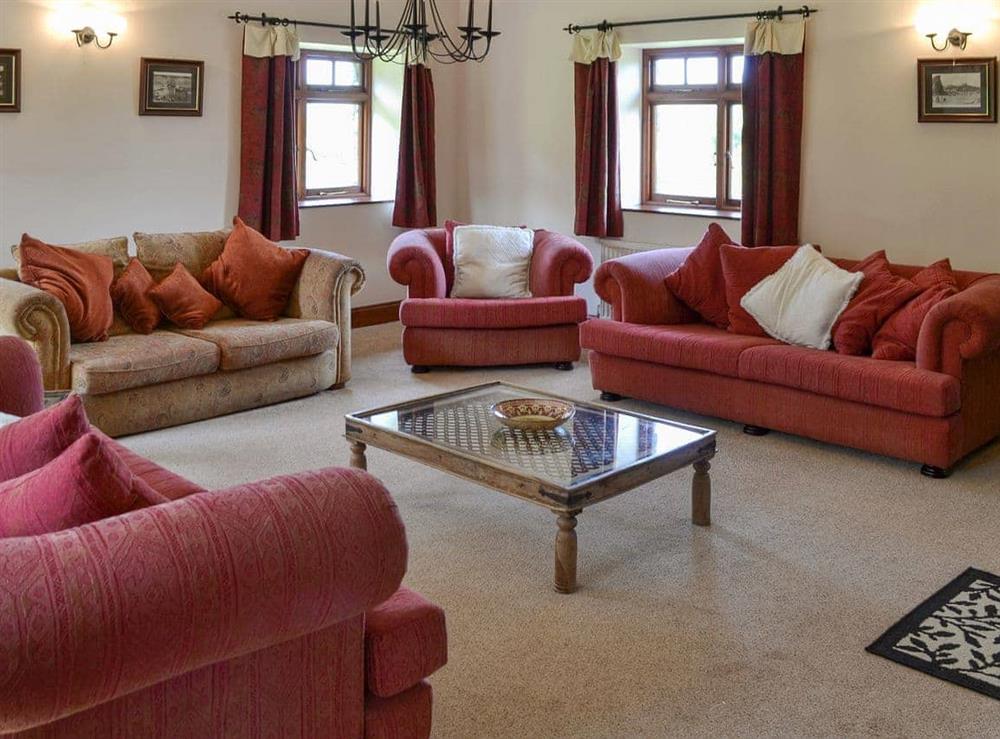 Large, comfortable living room at Trescowthick Barn in St Newlyn, Cornwall