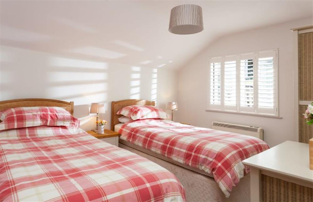 Trevarrow Cottage, Cornwall: Bedroom three on the higher first floor with twin beds and a garden view