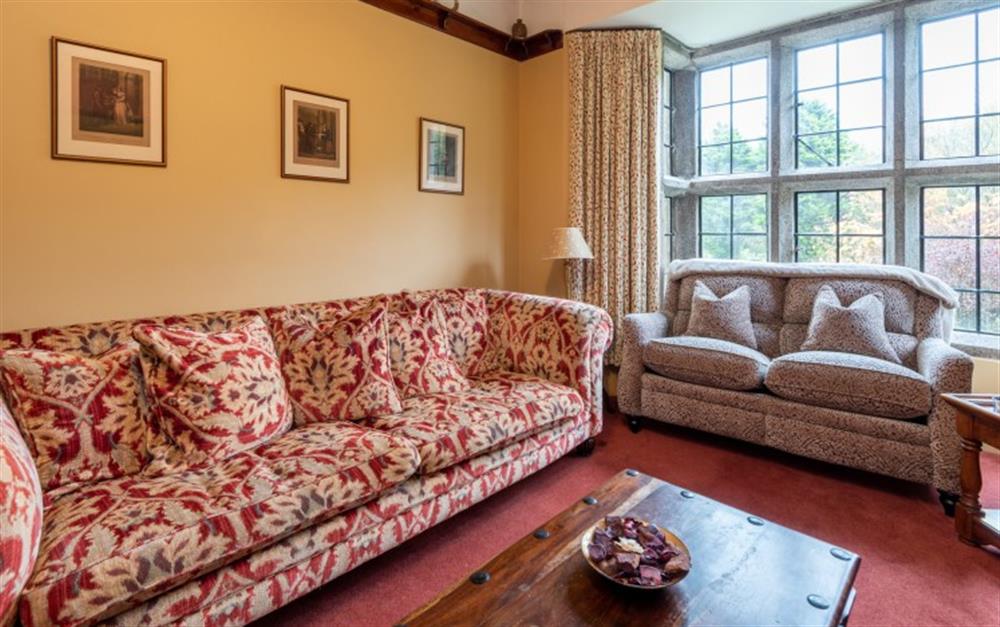 Relax in the living area at Treverbyn Vean Lodge  & Stable in St Neot