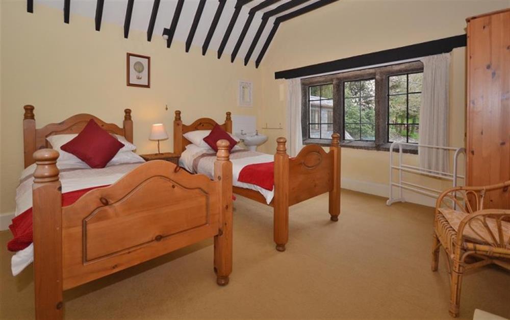 The spacious and comfortable twin bedroom at Treverbyn Vean Lodge in St Neot