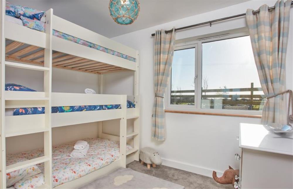 Treveth Lowen, Cornwall: Bedroom four, ideal for children with triple bunk beds at Treveth Lowen, St Minver