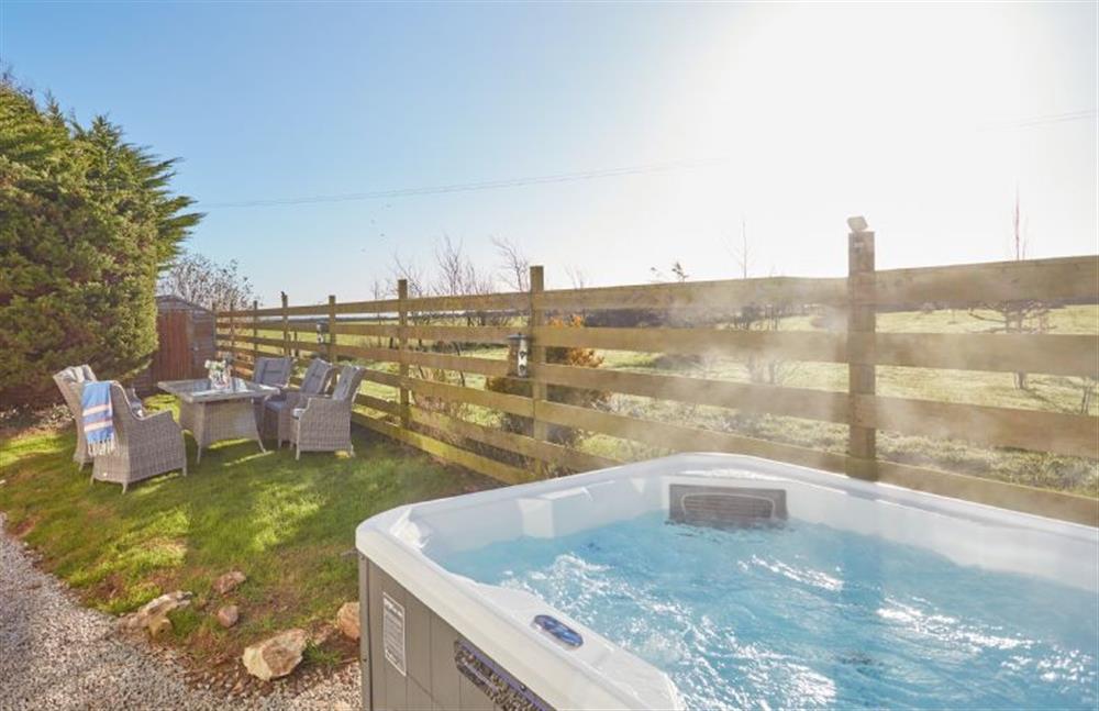 Treveth Lowen, Cornwall: Relax away while enjoying superb views from the hot tub at Treveth Lowen, St Minver