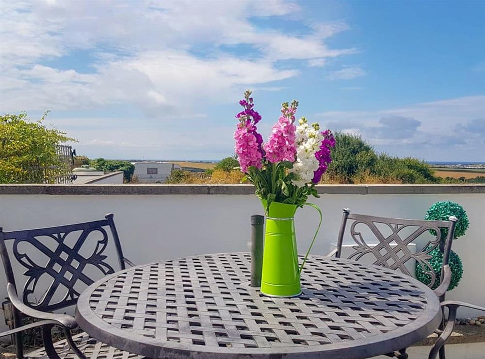 Patio with far reaching views (photo 2) at Trevone in St Merryn, near Padstow, Cornwall