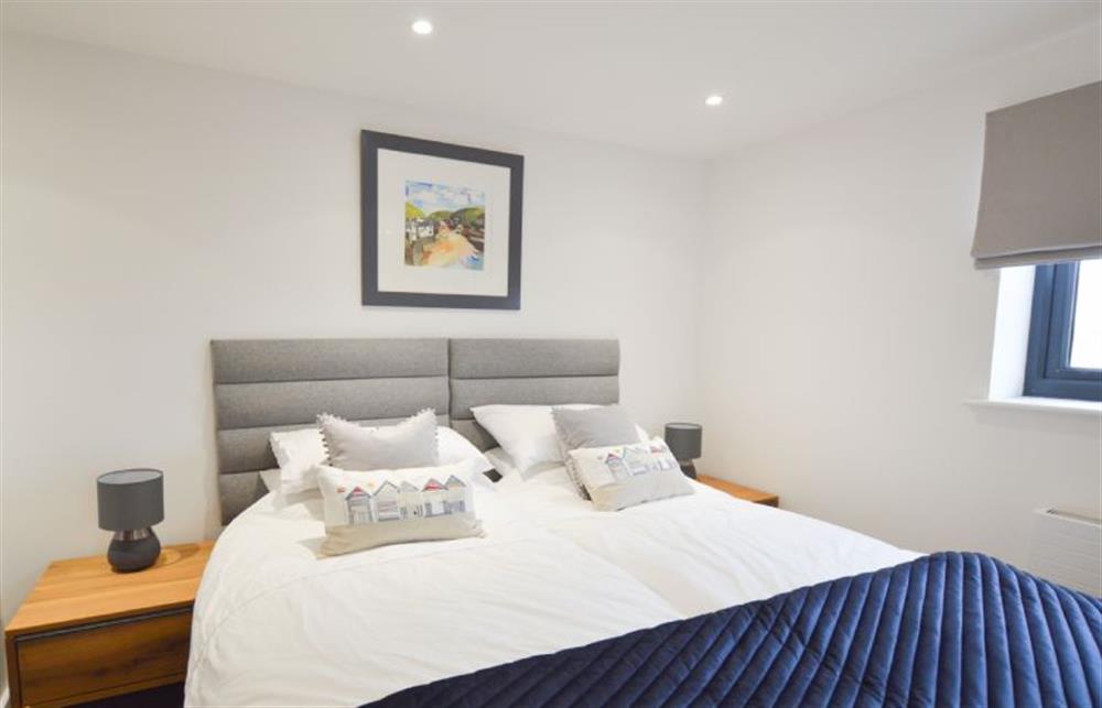 Bedroom two with super-king size bed (can be arranged as twin single beds on request) at Trevose Penthouse, Newquay