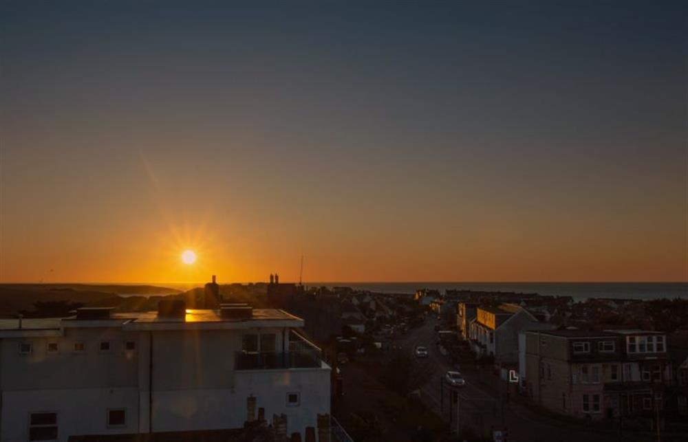 Watch the sunset go down from the luxury of the top floor balcony (photo 2) at Trevose Penthouse, Newquay