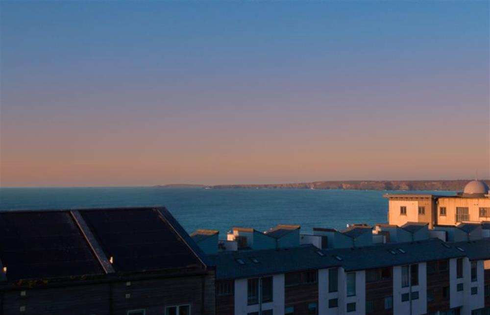 Watch the sunset go down from the luxury of the top floor balcony at Trevose Penthouse, Newquay