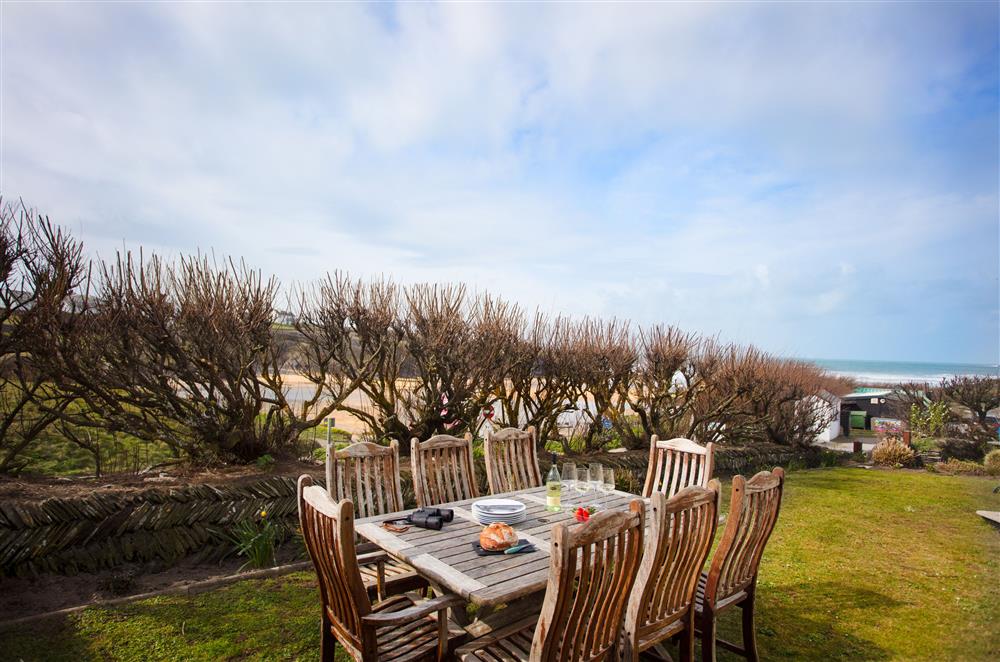 Garden dining table for up to eight guests overlooking Treyarnon Bay at Trewalder, Treyarnon Bay, St Merryn