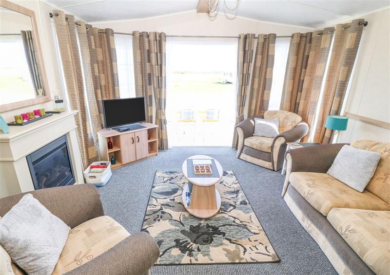 Enjoy the living room at Trewan Lodge, Bryngwran near Rhosneigr