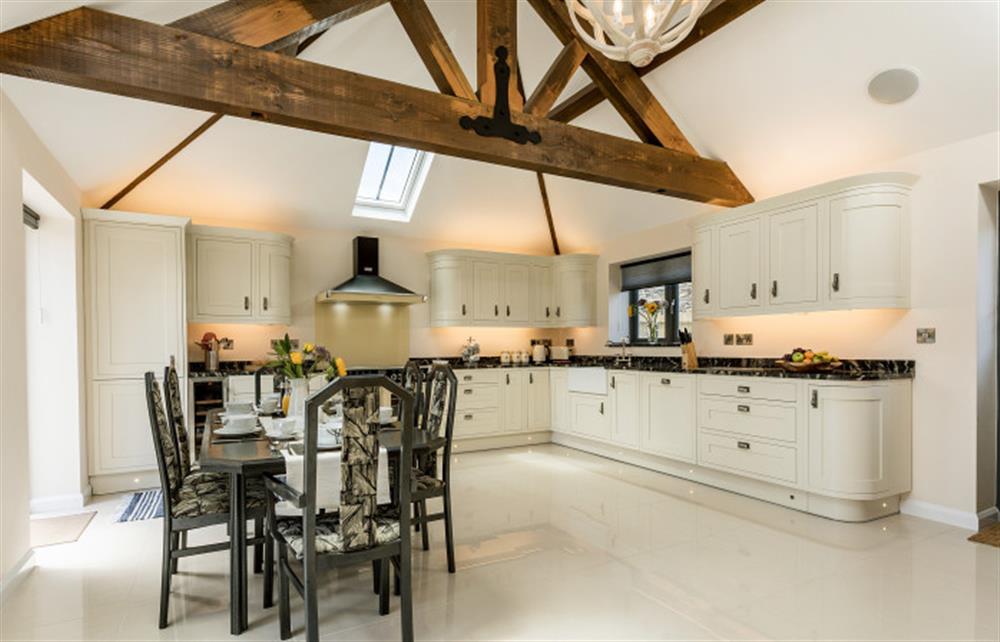 The kitchen next to the paved patio at Trewethan Barn, Tintagel