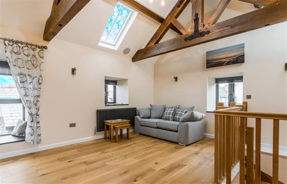 The other end of the lounge with separate seating at Trewethan Barn, Tintagel