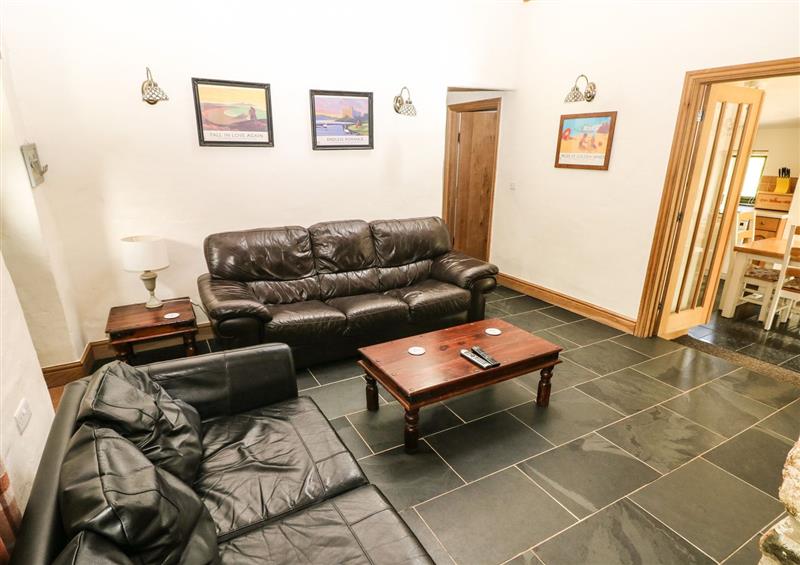 Relax in the living area at Trewrach Cottage, Dinas Cross