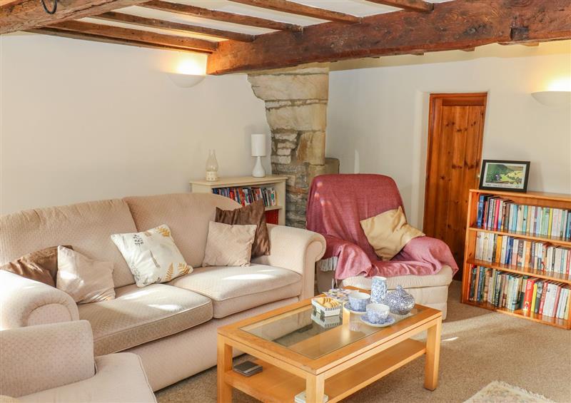 Relax in the living area at Trickett Gate Cottage, Castleton