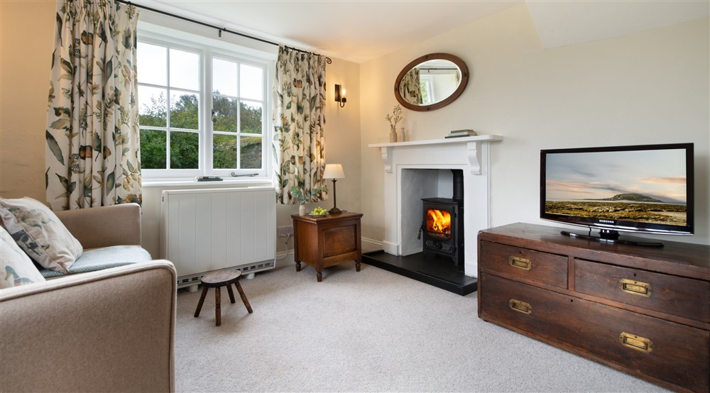 The sitting and dining room at Triggabrowne Dairy Cottage in Lanteglos-by-fowey, Cornwall