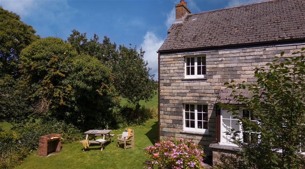 The exterior of Triggabrowne Cottage, Cornwall at Triggabrowne Farm House in Lanteglos-by-fowey, Cornwall