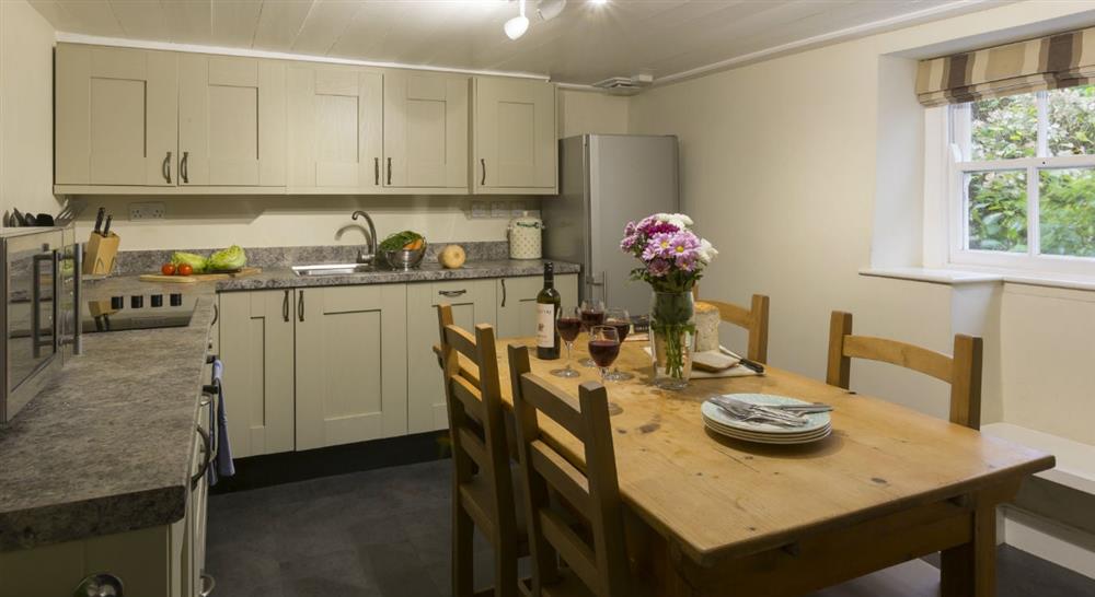 The kitchen and dining area at Triggabrowne Farm House in Lanteglos-by-fowey, Cornwall