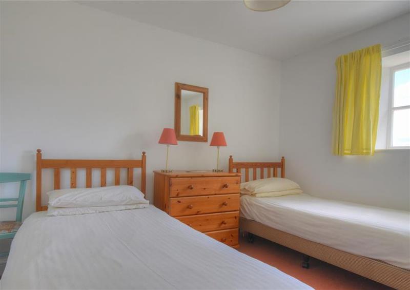 One of the 3 bedrooms at Trill Cottage, Musbury