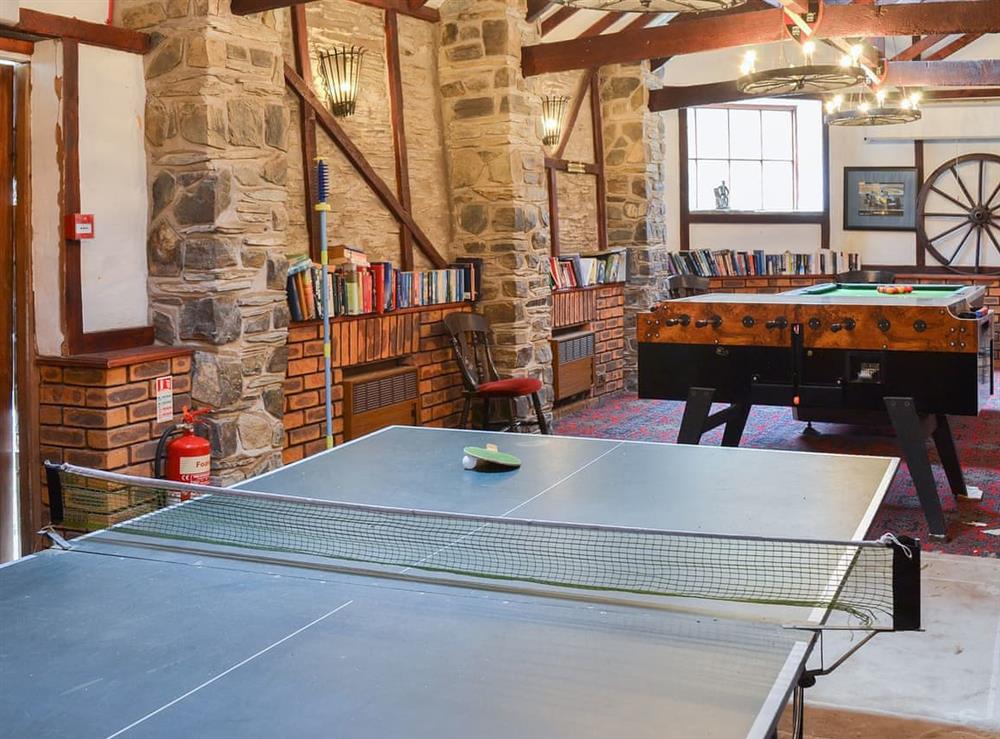 Shared games room with many activities for a rainy day at Gate Cottage, 