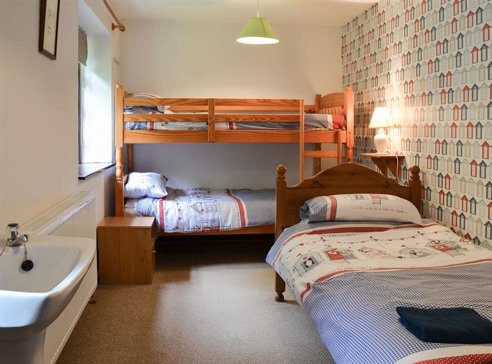 Single bedroom with additional bunk beds at Gate Cottage, 